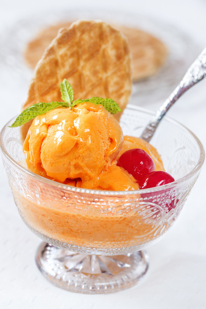 Orange ice crem served in a cup with waffles - Zdjęcie, obraz