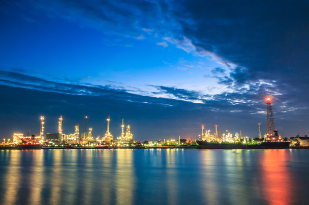 Oil refinery in evening - Фото, изображение