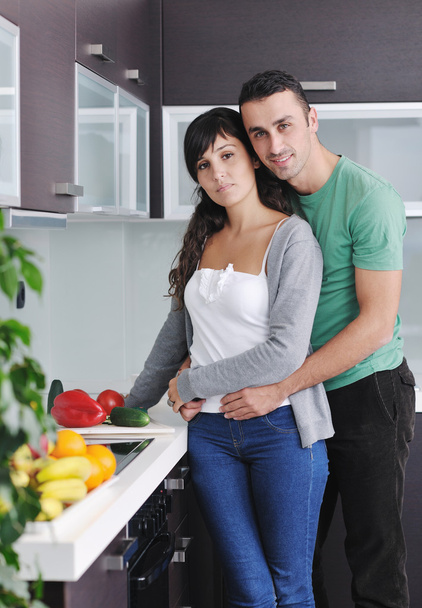 Young couple have fun in modern kitchen - Fotoğraf, Görsel