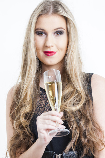 young woman with a glass of champagne - Zdjęcie, obraz