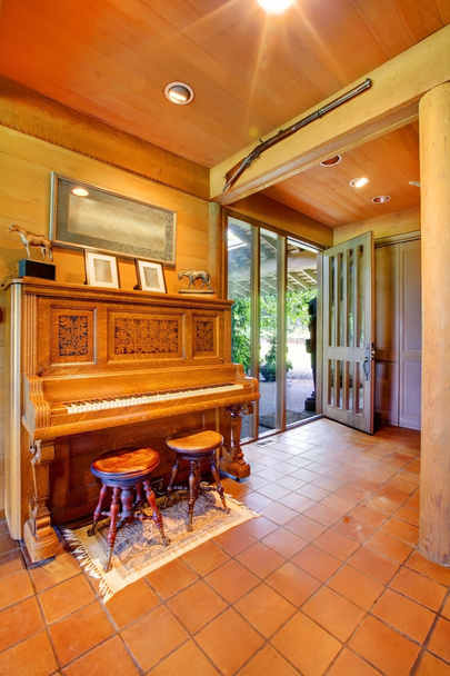 Piano with an open door at the horse ranch. - Φωτογραφία, εικόνα