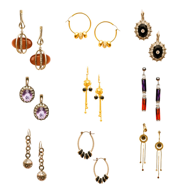 Συλλογή από διάφορα σκουλαρίκια που απομονώνονται σε λευκό - Φωτογραφία, εικόνα