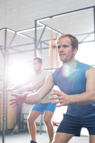 men exercising in crossfit gym - Foto, Bild