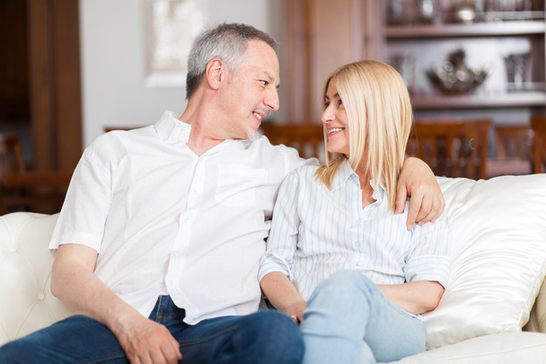 mature couple talking in home - Photo, Image