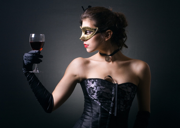 Young ladies with a glass of red wine. - Photo, Image