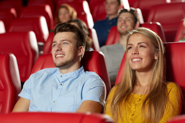 happy friends watching movie in theater - Zdjęcie, obraz