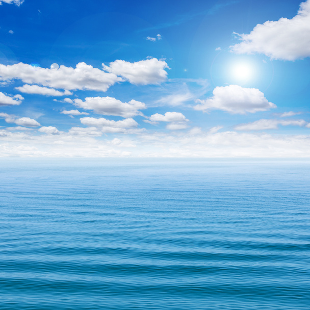 Sea and blue sky with sun - Fotó, kép