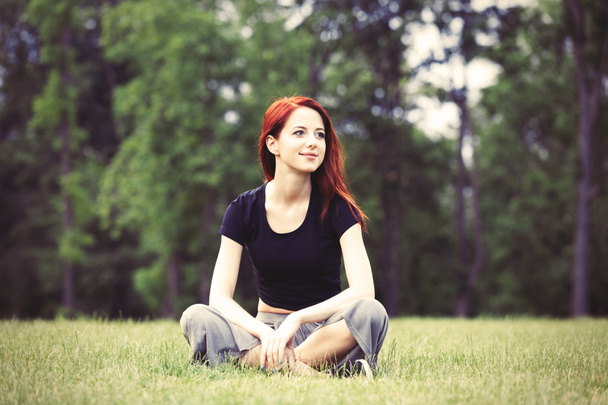 woman relaxing in the lawn - Photo, image