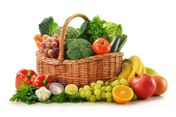 Composition with vegetables and fruits in wicker basket isolated - Photo, Image
