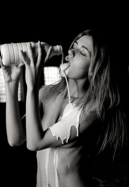 Woman with a bottle of milk - Фото, зображення