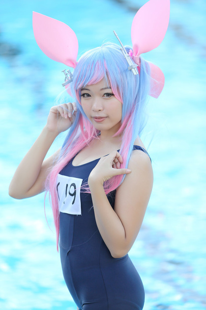 Aasian tyttö cosplay kanssa uimapuku
 - Valokuva, kuva