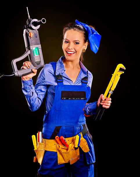 Costruttore donna con utensili da costruzione
. - Foto, immagini