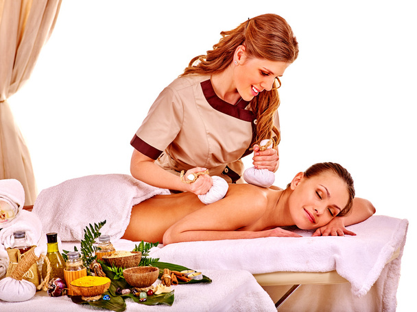 Woman getting herbal ball massage - Photo, Image