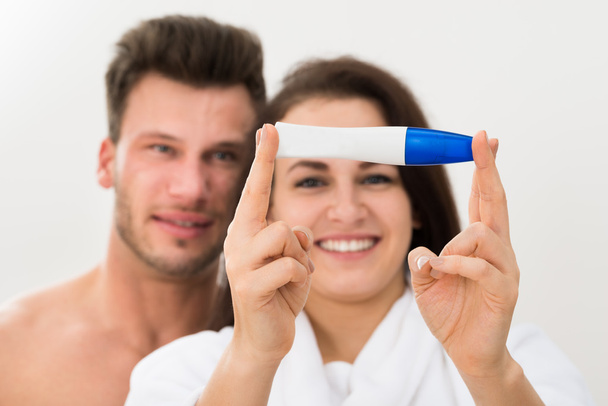 Couple with Result Of Pregnancy Test - Photo, Image