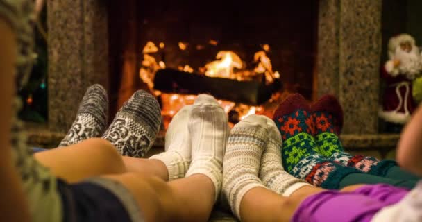 Feet warming by cozy fire - Footage, Video