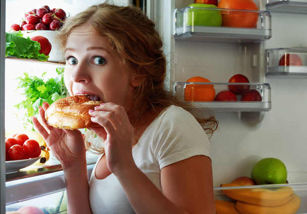 Woman eats night stole the refrigerator - Photo, Image