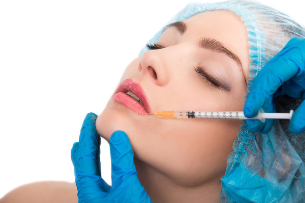 woman receiving  botox injection - Foto, immagini