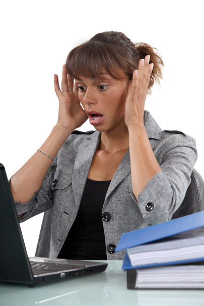 Distressed woman with laptop - Фото, зображення