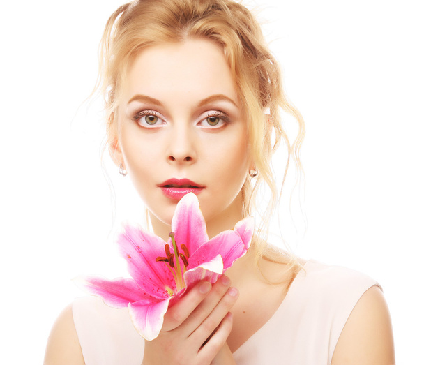young woman with pink lily - 写真・画像