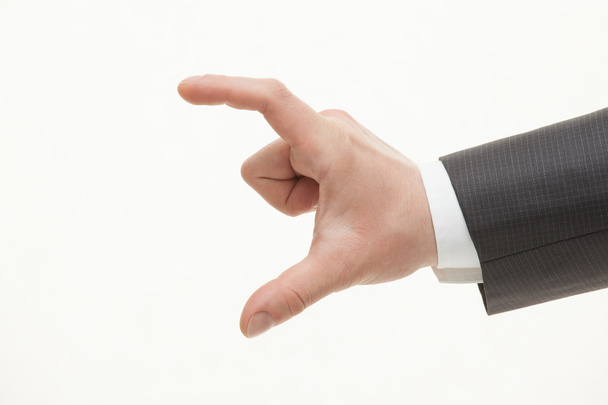Businessman's hand showing big size - Фото, изображение
