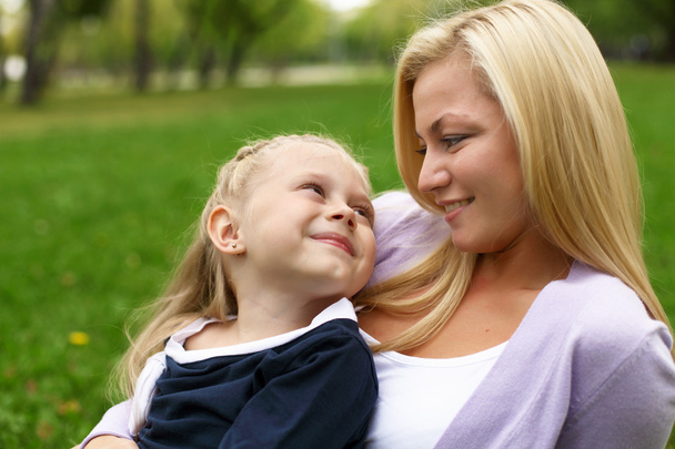 Mother and daughter in park - Photo, Image
