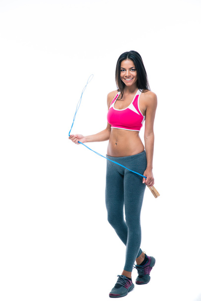 Smiling sports woman holding skipping rope - Φωτογραφία, εικόνα