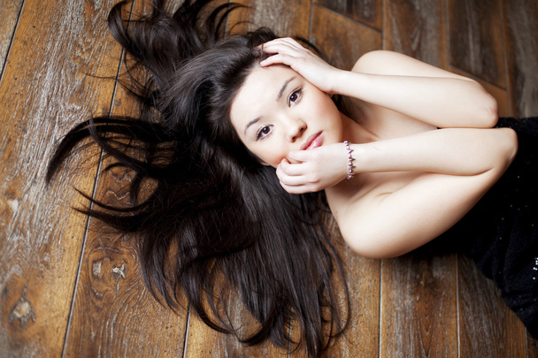Beautiful asian girl with beautiful black hair - Photo, image