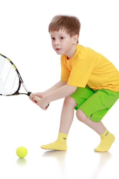 Little boy playing tennis - Фото, зображення