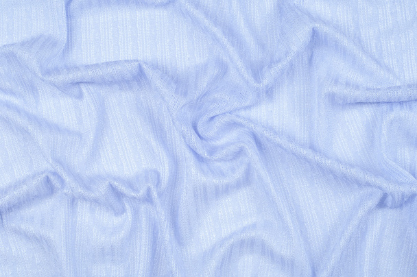lila Textur. Gewebe, Textilien, Stoffe, Stoffe, Stoffe, die typischerweise durch Weben oder Stricken von Textilfasern hergestellt werden. - Foto, Bild
