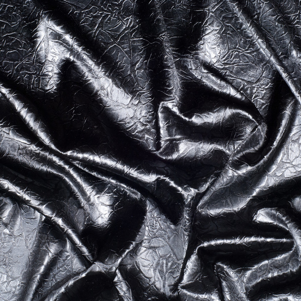 Weefsel textuur zijde zwart. Met grijze stippen. abstractie - Foto, afbeelding