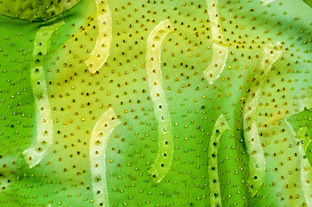 Шелковая ткань текстура, фон. зеленый и желтый цвет
 - Фото, изображение
