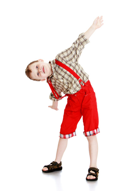 Portrait of little boy in red shorts - Fotoğraf, Görsel