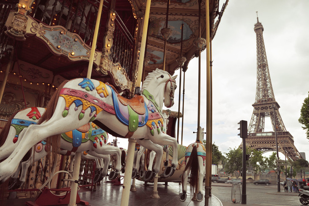 Image of vintage carousel near Eiffel tower in Paris, France - Photo, Image