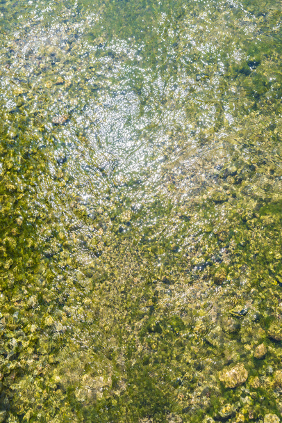 Річка з камінням як фон
 - Фото, зображення