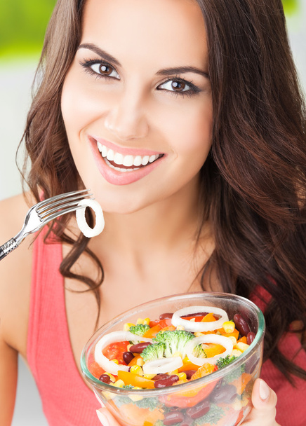 Smiling woman with salad, outdoor - Zdjęcie, obraz
