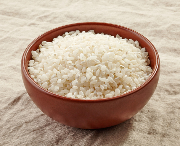 tazón de arroz redondo crudo
 - Foto, imagen