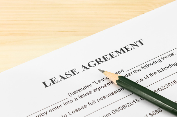 Lease Agreement Contract Document and Pencil at Bottom Right Corner - Фото, зображення