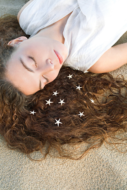 woman with star fish on  hair - Photo, Image