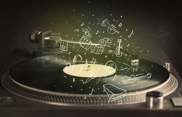 Turntable playing classical music with icon drawn instruments  - Foto, Bild