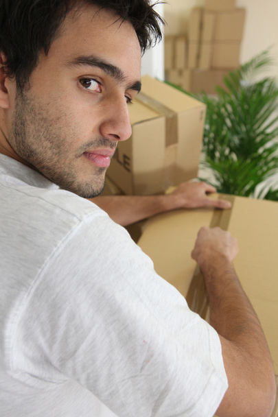 Man packing moving box - Photo, Image