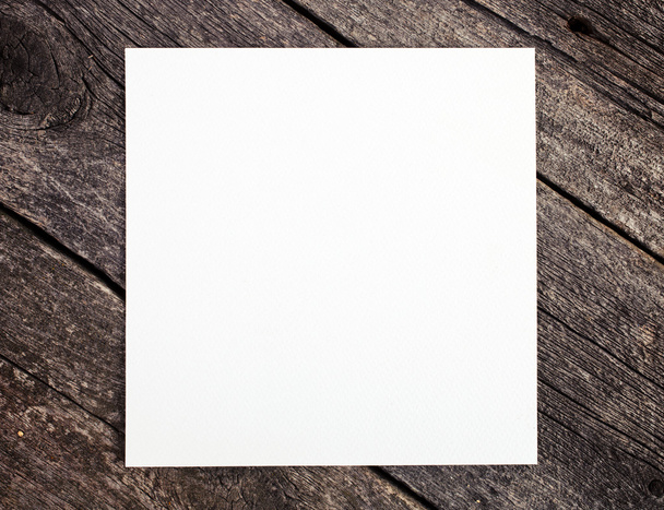 wooden background with blank paper - Fotó, kép