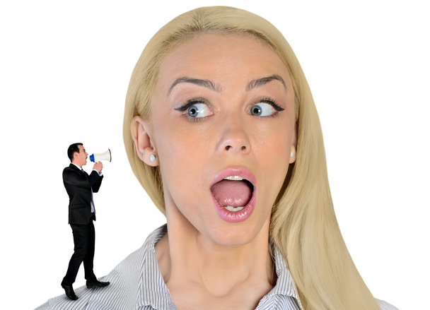 Business woman looking surprised on little man - Photo, Image