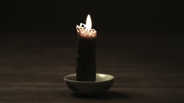 burning candle made of natural honeycombs - Filmmaterial, Video