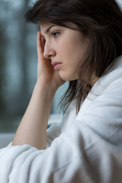 surullinen nainen, jolla päänsärky
 - Valokuva, kuva