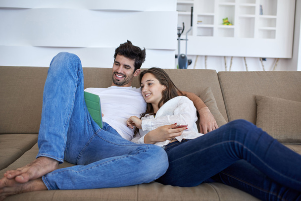 young couple relaxing at modern home - Φωτογραφία, εικόνα