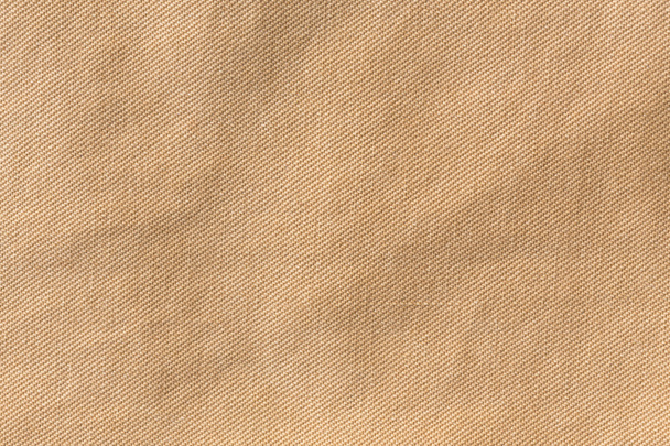 bruine weefsel textuur achtergrond, materiaal voor textiel industrial - Foto, afbeelding