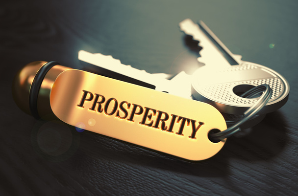 Ключи со словом "процветание" на золотой этикетке
. - Фото, изображение