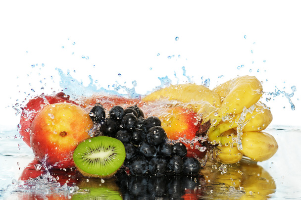 Pure fruit in a spray of water - Foto, Imagen