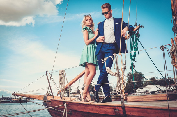 Stylish wealthy couple on a luxury yacht  - Photo, Image