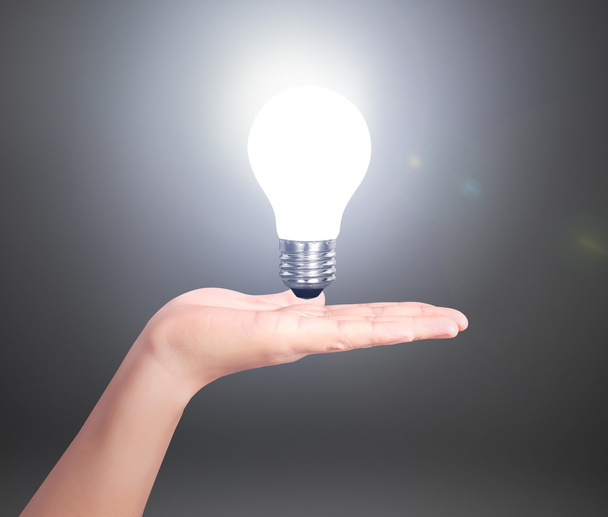 Creative light bulb idea in the hand - Φωτογραφία, εικόνα